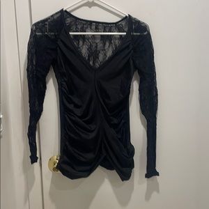 Fashionable black Lycra top with lace and rushing